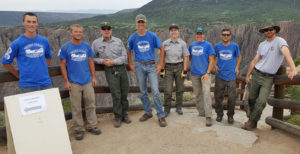 Western Colorado Youth Corps group of corps member on an mountain outlook